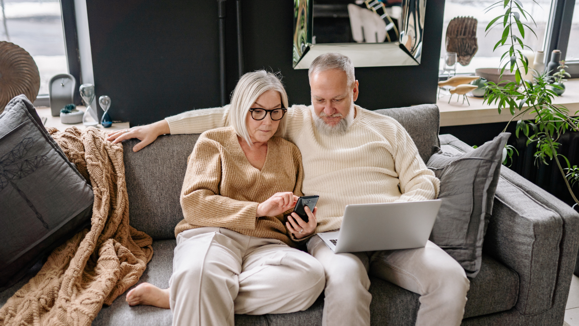 Couple researching what to know before moving to Sarasota Florida